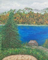 Pine tree, cabin next to a lake with trees in fall colors and mountains in the background