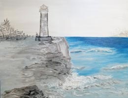 Ocean and shoreline with lighthouse